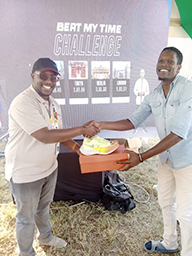 Participant getting awarded winning BeatMyTime Challenge VR Nairobi Kenya